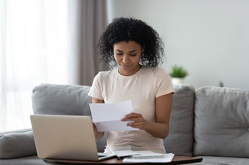 woman looking at financial information
