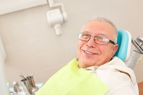smiling man at dental office
