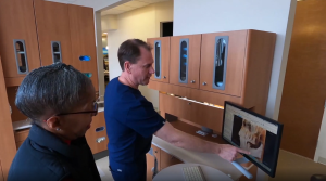 Dr. Dickson showing patient x-ray